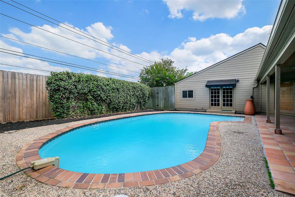 Sparkling private pool just steps away from the door. Access to the pool from 3 areas of the home, including the primary bedroom.