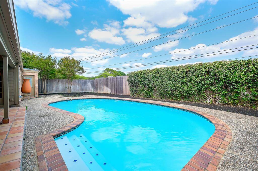 Sparkling private pool just steps away from the door. Access to the pool from 3 areas of the home, including the primary bedroom.