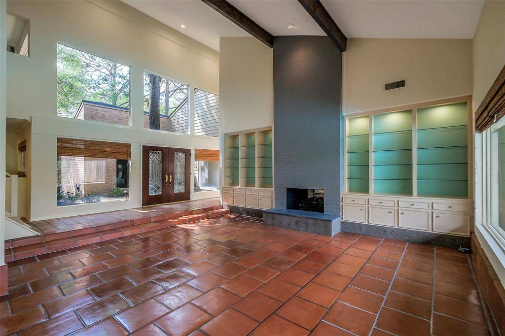 Ample natural light & high ceilings. Recently completed designer finishes, including updating, painting, fixtures & lighting.