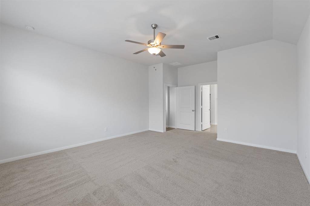 Primary walk-in closet.