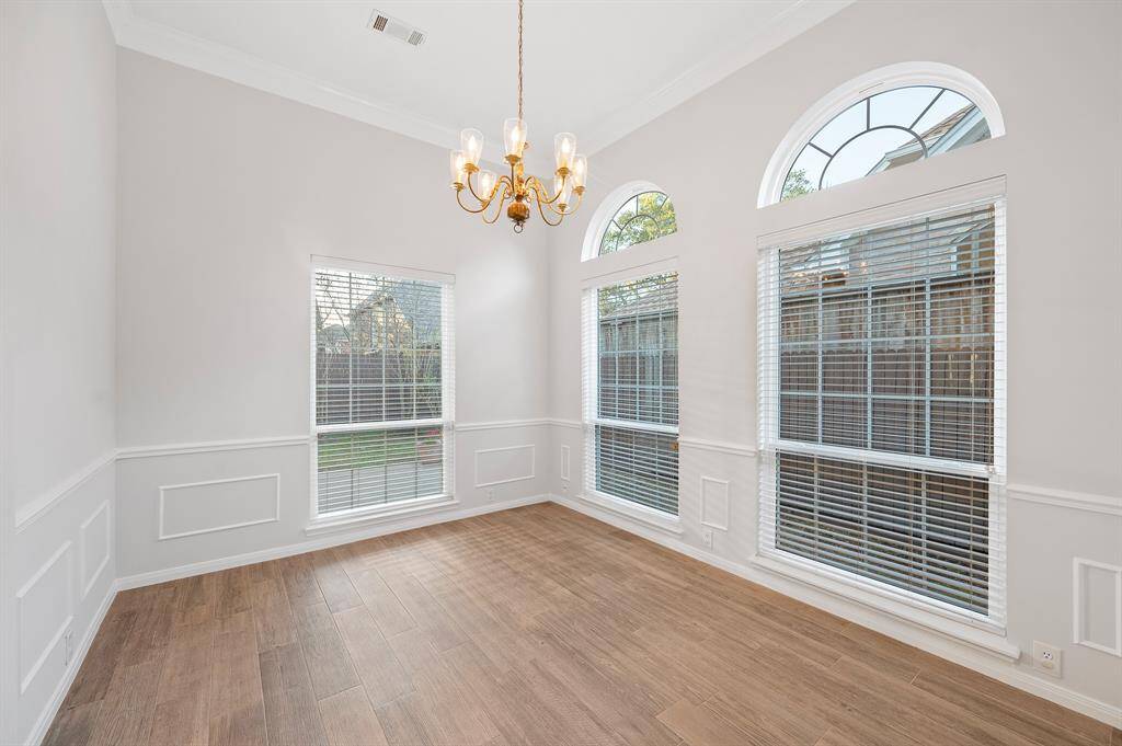 A wall of windows and ample space to entertain and dine.