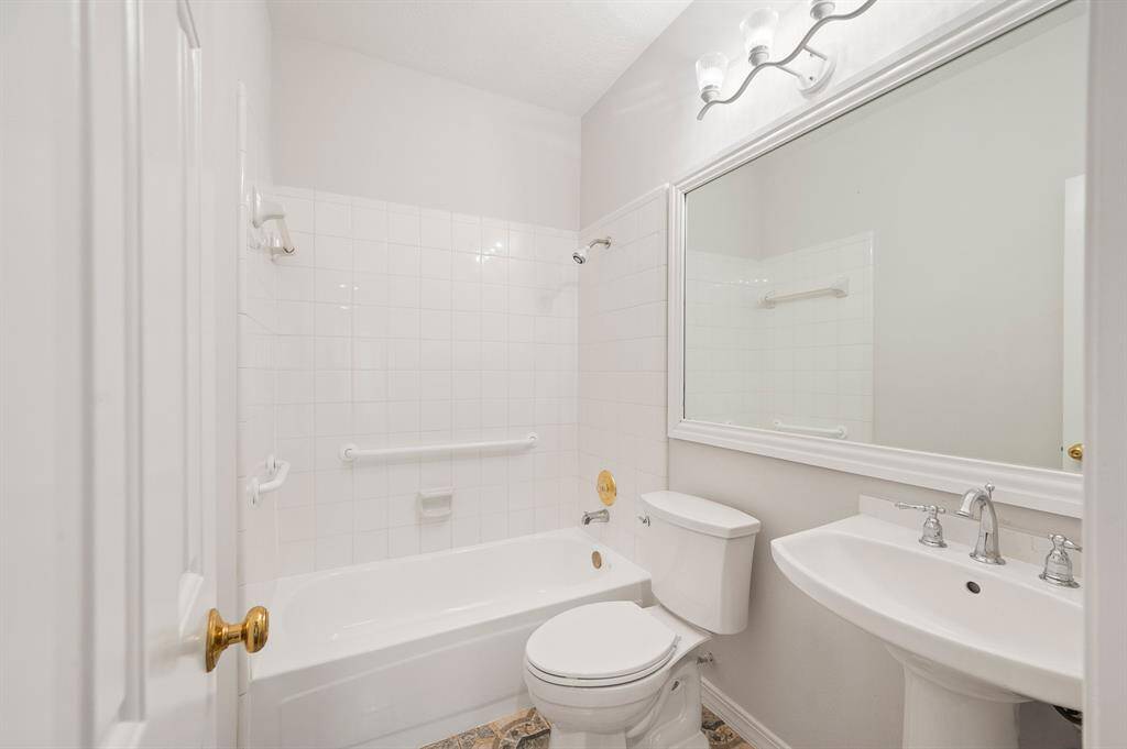 The second downstairs bath has easy access to guests
