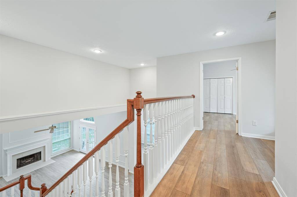 Hall way upstair connecting the game room and the secondary bedrooms, overlook the main living room