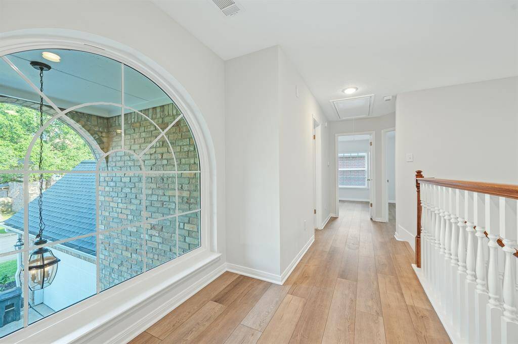 The second floor hall, the game room (can be used as the 5th bedroom) is on the opposite side of the bedrooms.