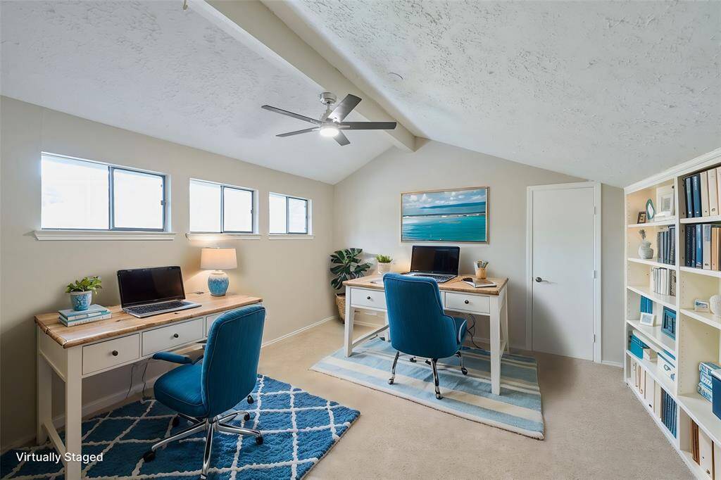 The Loft could be a Game-room or 4th Bedroom.  Includes a Remote Controlled Ceiling Fan, recent Carpet, a Walk-in Closet and Overlooks the Backyard.