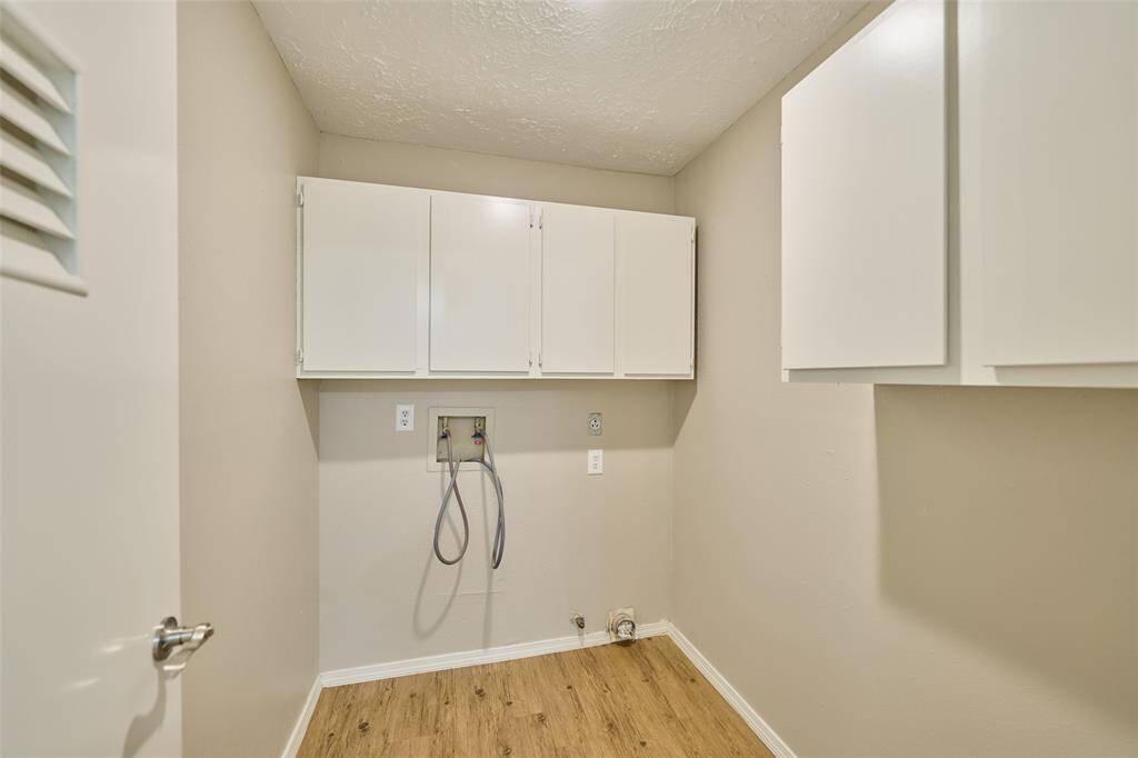 Laundry Room has much Storage!