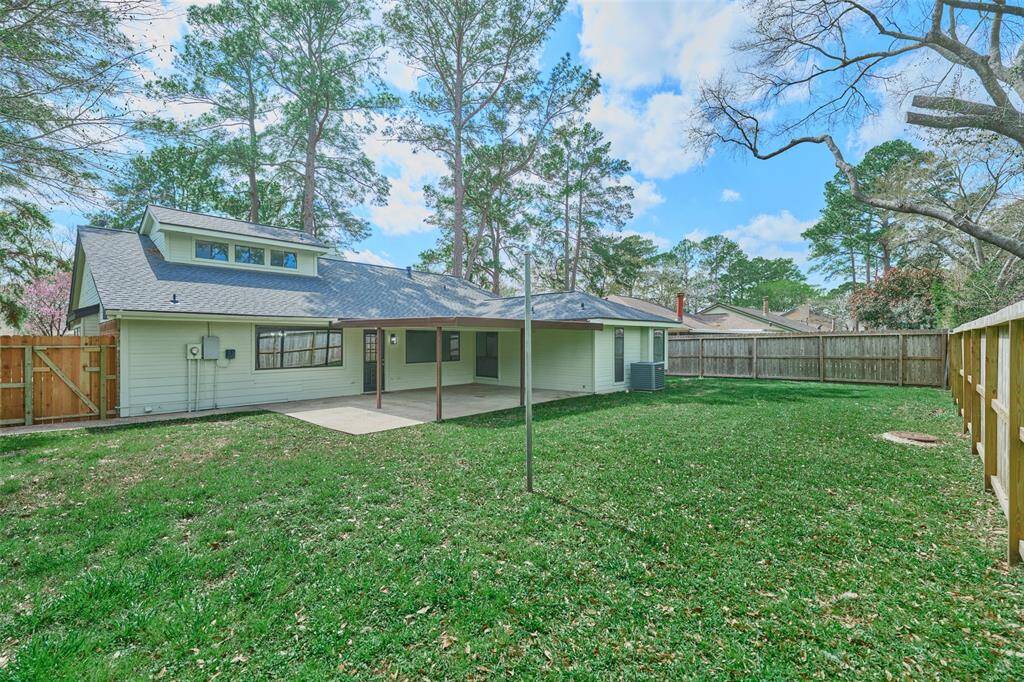 Views of the New Windows, New roof, and New Gate! Freshly insulated Attic, too! A/C in June 2020!  Spacious Backyard for Family Fun, Entertainment and Large Enough for a Pool!