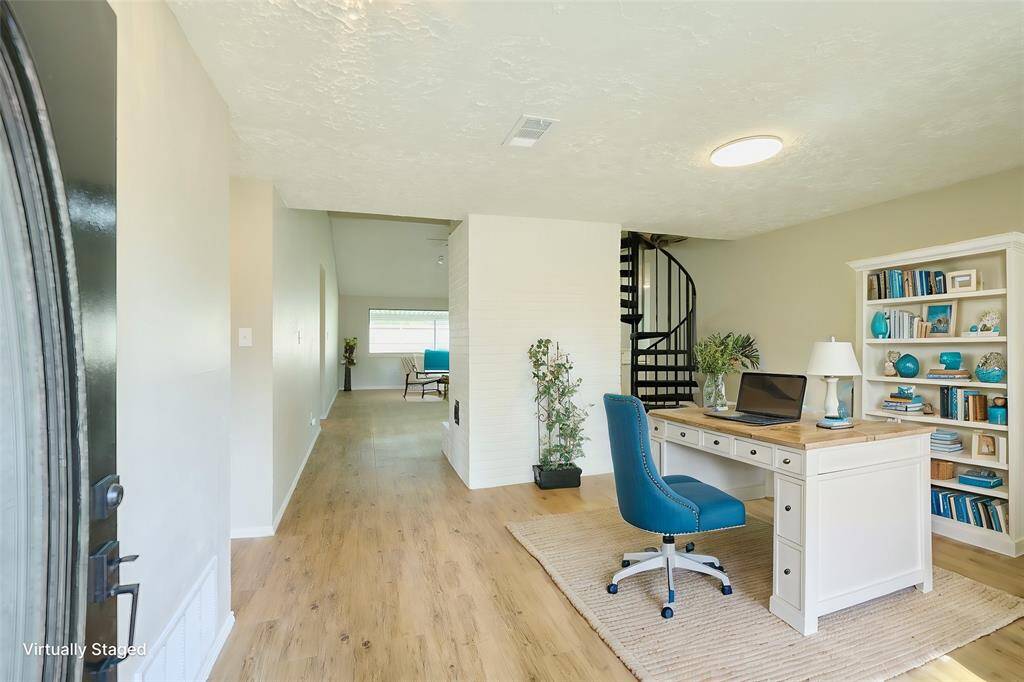 Welcome your Guest to this beautifully renovated Home! Front Room could be an Office or Play Room. Handsome Spiral Staircase leads to Upstairs Loft.