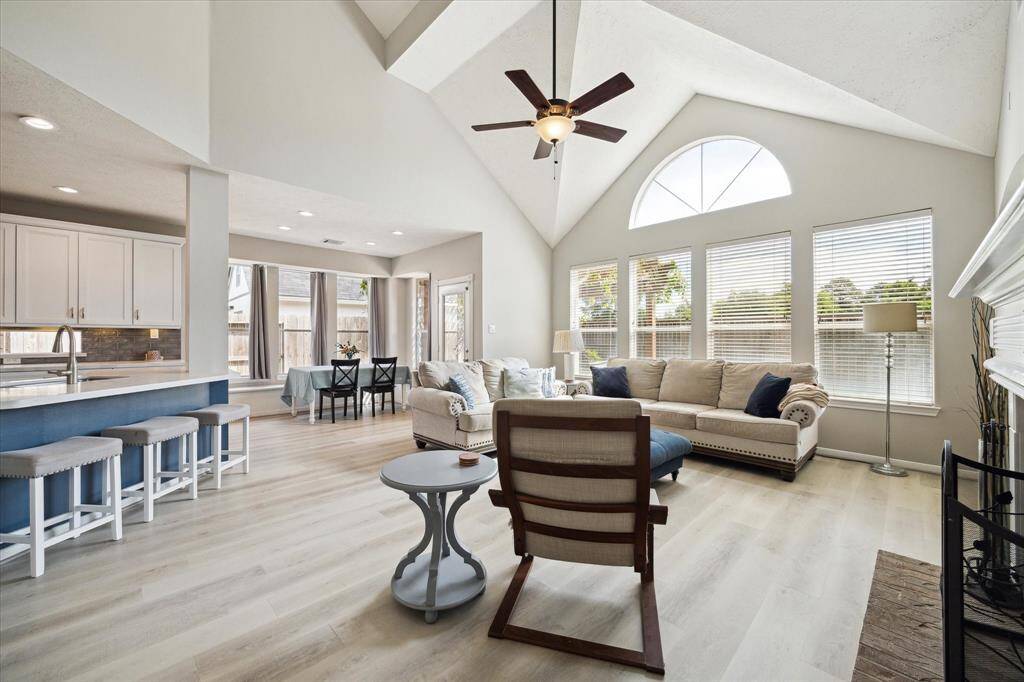 Experience the spacious elegance of an open floor plan with soaring ceilings and abundant natural light.