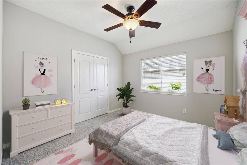 Charming upstairs secondary bedroom, beautifully virtually staged for inspiration.