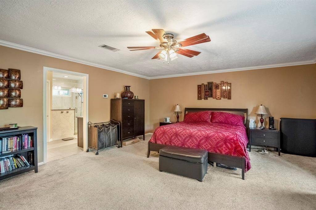 The primay is located at the far end of the upstairs, with a renovated bathroom.