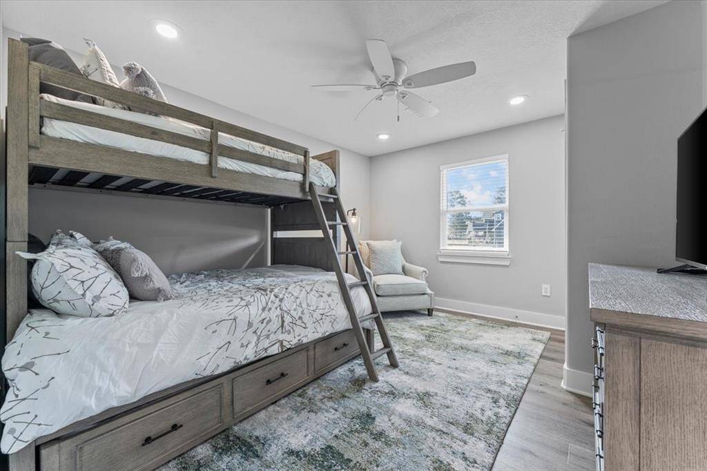 The secondary bedroom is large enough for a bunk bed, dresser and a sitting area! Each bedroom has a large closet!