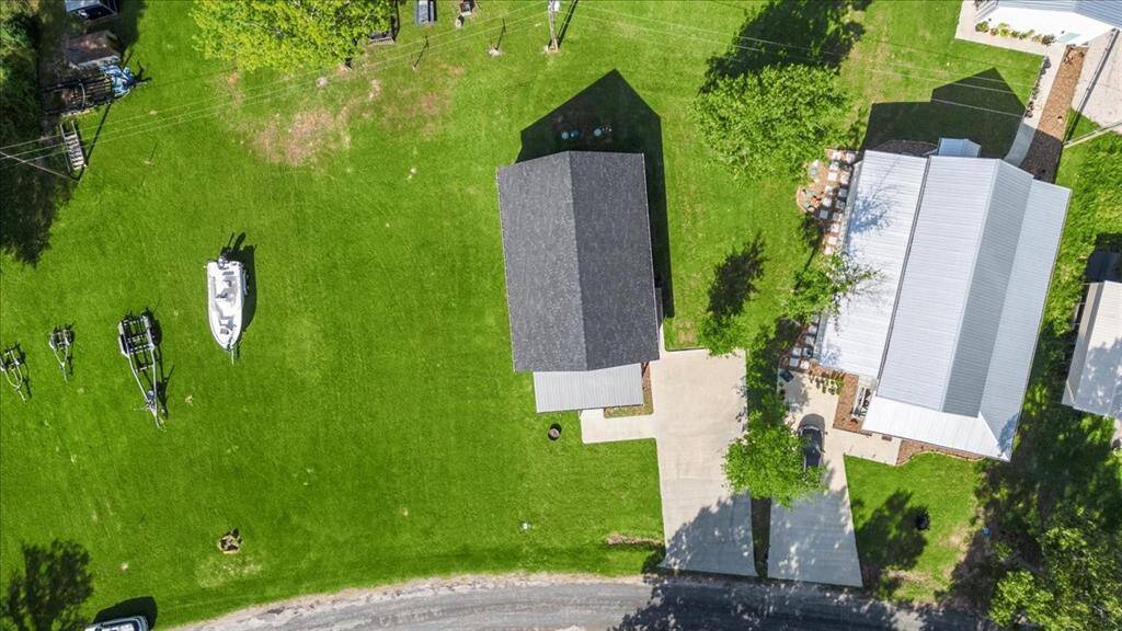 Lots of additional room to add a garage, carport or extend the driveway!