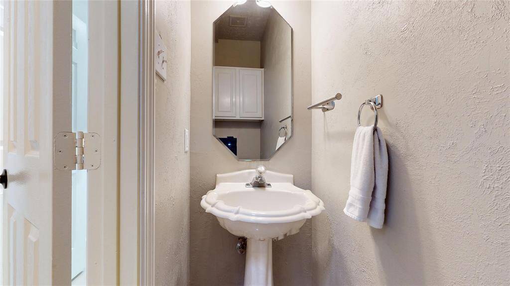 The Powder Room downstairs located by the Laundry Room.