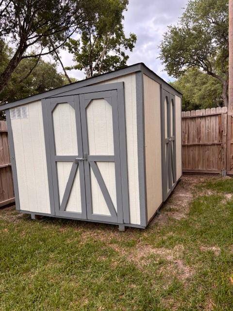 Exterior shed perfect to store any of your items.