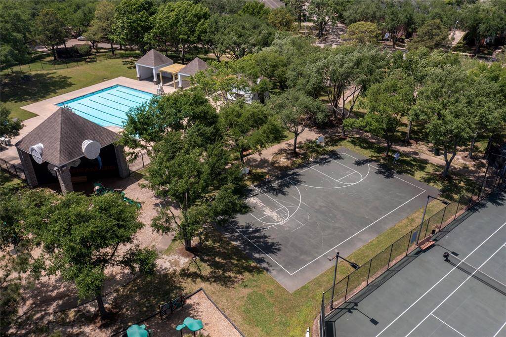 The neighborhood park with pool, basketball courts, playground and tennis courts.