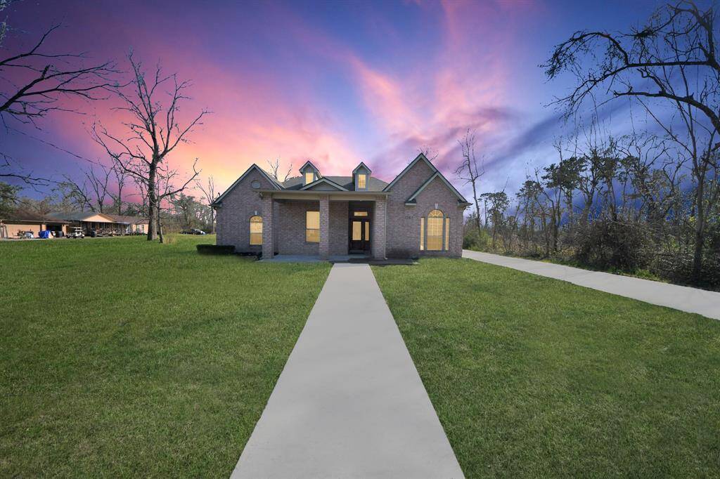 This stunning custom-built, one-story home is perfectly situated on a spacious 1-acre lot