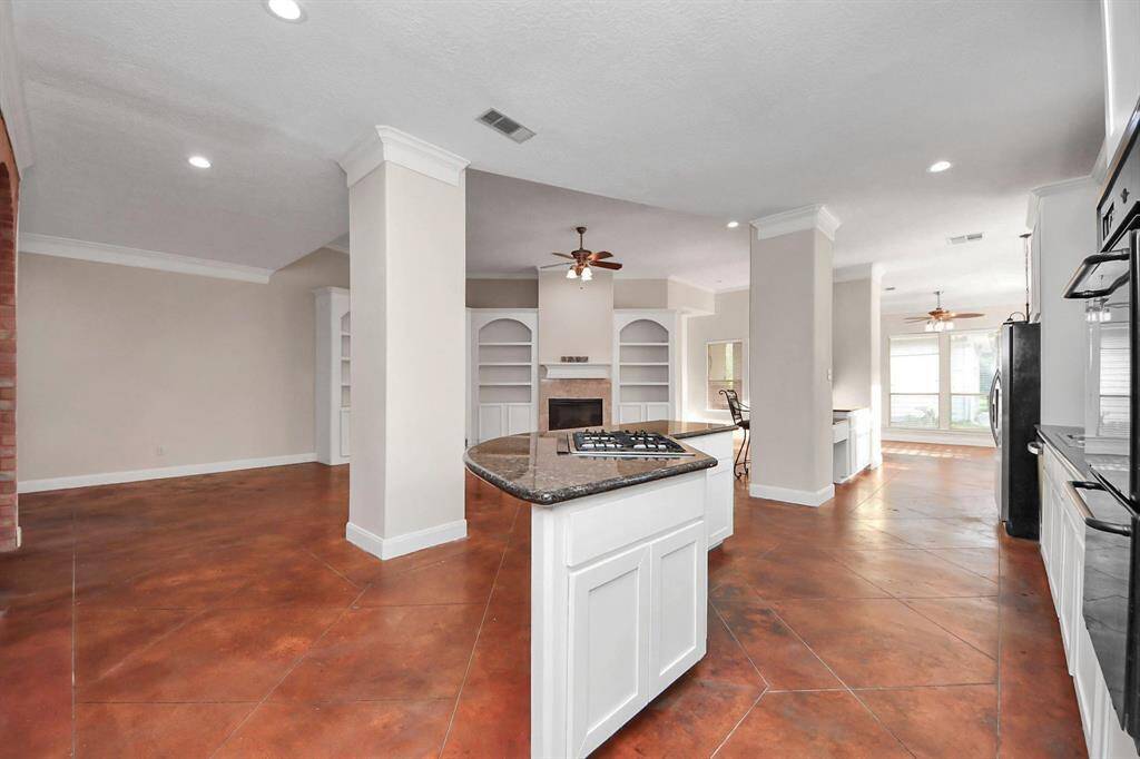 The seamless flow between spaces makes it ideal for both everyday living and entertaining.