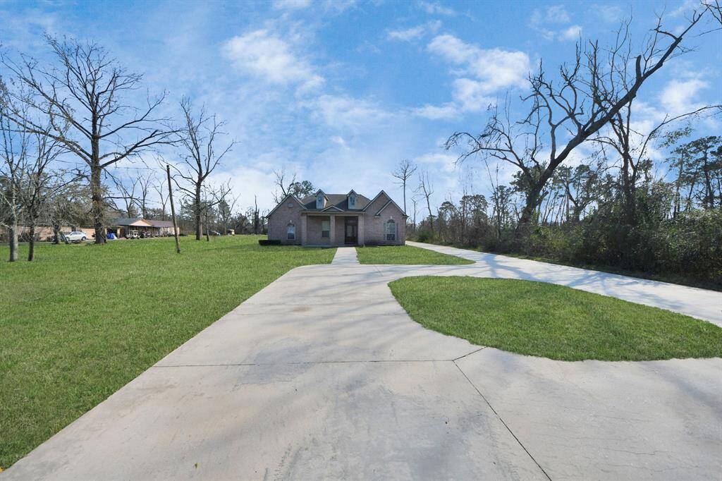 Framed by a beautifully landscaped front yard, the exterior exudes timeless charm and curb appeal.