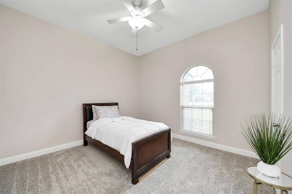 The home features three spacious secondary bedrooms, each thoughtfully designed to provide comfort, functionality, and a touch of custom charm.