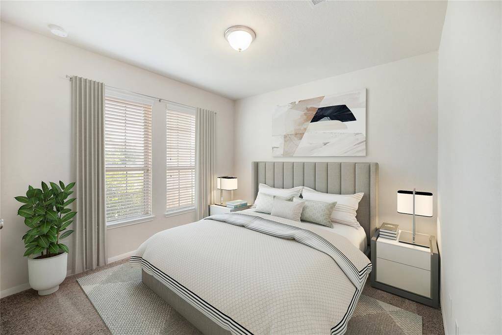 For reference, the secondary bedroom has been virtually staged to showcase its full potential and functionality.
