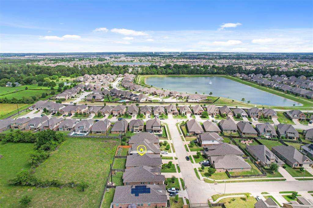 This alternate side aerial view offers a look at the opposite side of the community, providing a broader perspective of the neighborhood layout.