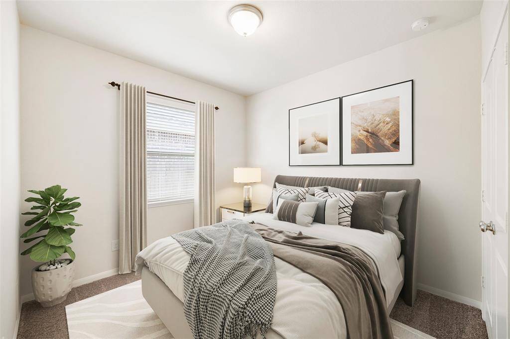 For reference, the secondary bedroom has been virtually staged to showcase its full potential and functionality.