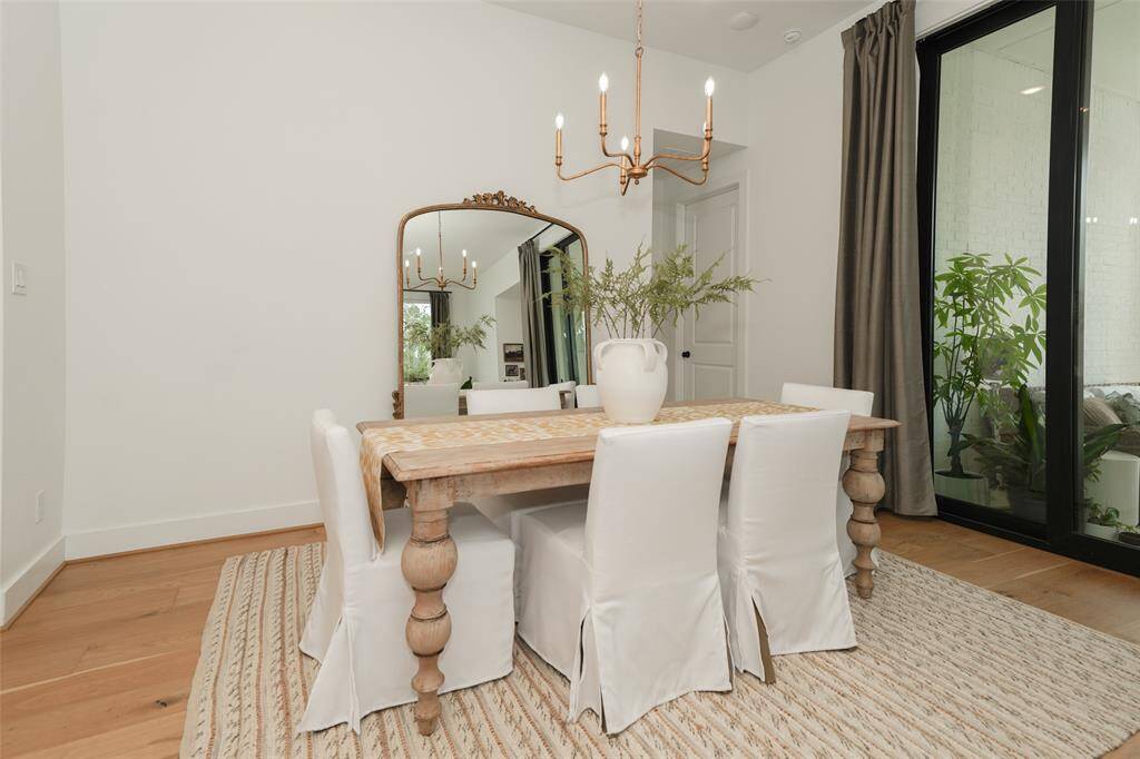 Expansive sliding glass doors invite abundant natural light and seamless indoor-outdoor living.