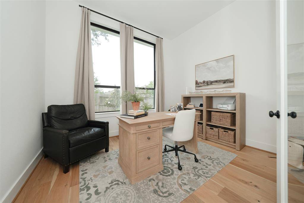 Bright and inviting study with expansive windows.