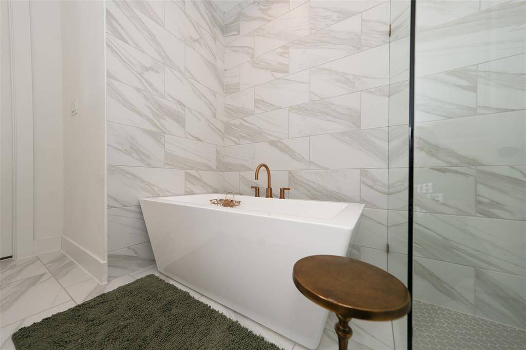 Luxurious soaking tub for ultimate relaxation.