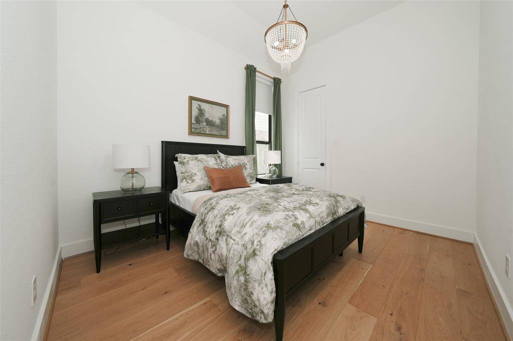 Inviting guest suite with elegant finishes and ample natural light.