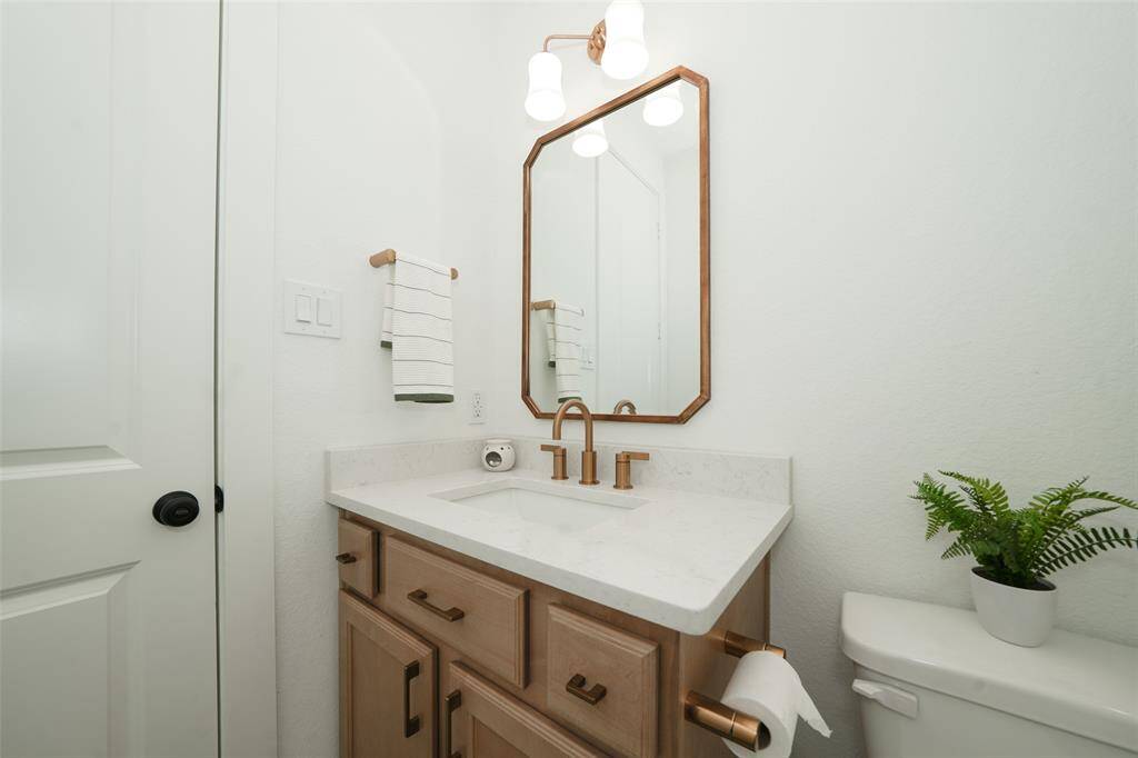 Luxurious full bath adjoining the additional suite.