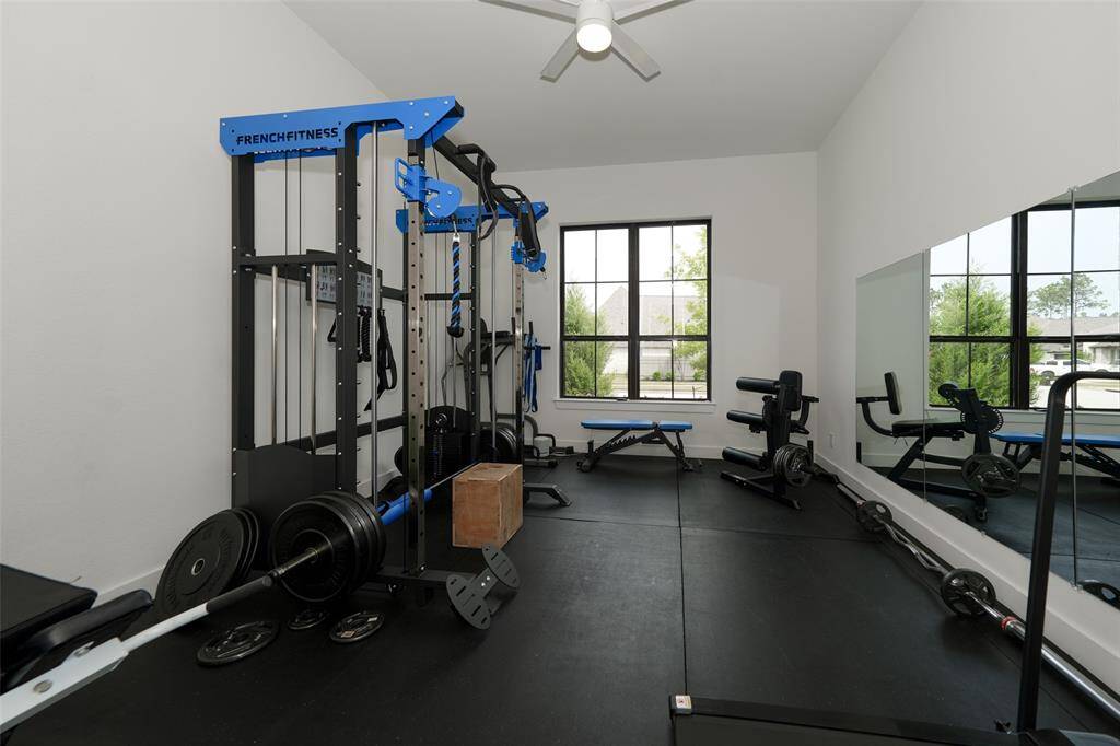 Versatile bedroom equipped as a modern home gym.