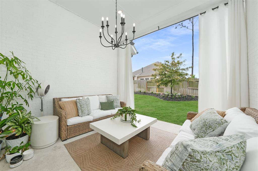 Experience serene outdoor living in this beautifully designed patio space, perfect for relaxation and entertaining.