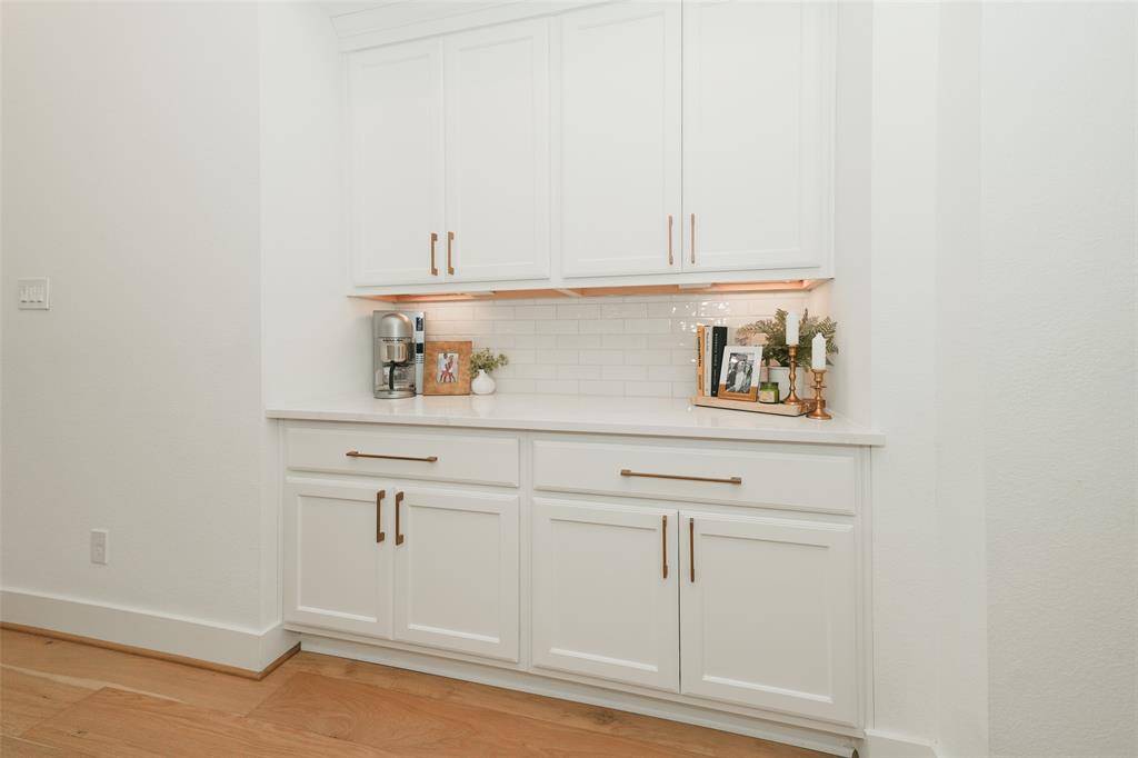 Efficient kitchen storage and sleek work area.