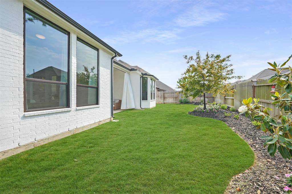 Spacious backyard perfect for a pool installation.