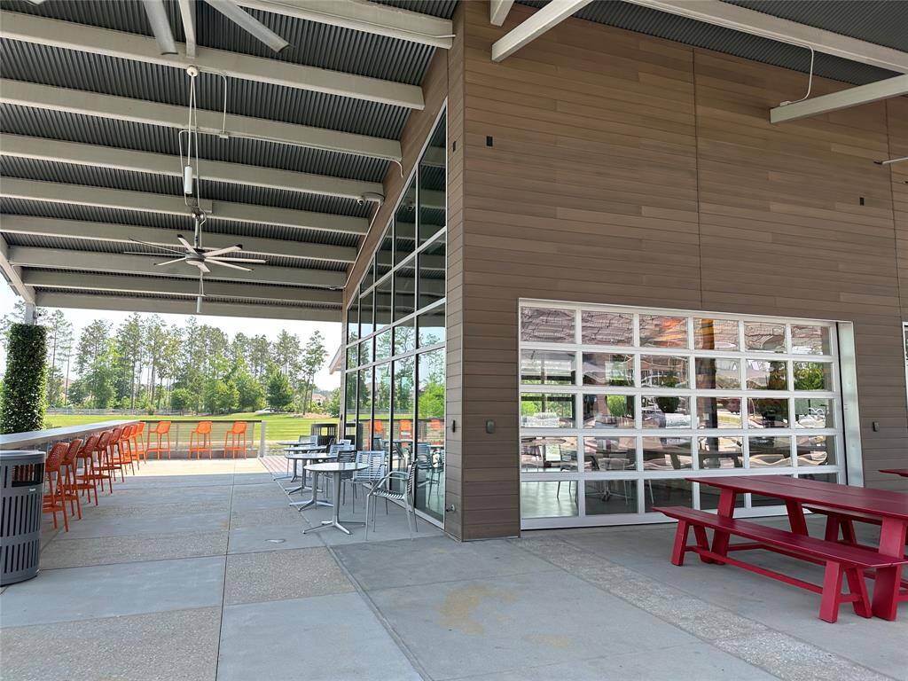 Enjoy a relaxing atmosphere at this modern café, featuring ample outdoor seating and scenic views, perfect for unwinding or socializing.