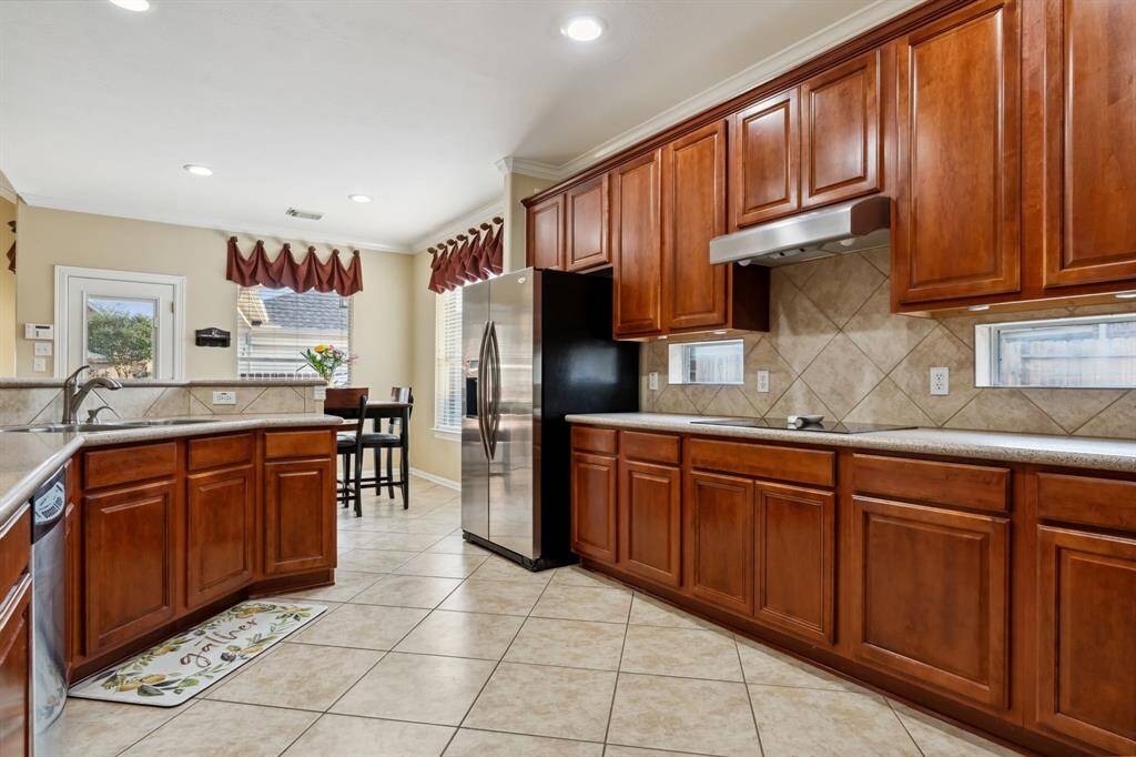 Tile Flooring, Recessed Lights, Crown Moulding