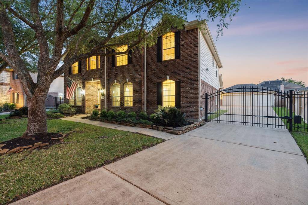 3 Car Detached Garage with Deep Concrete Driveway.