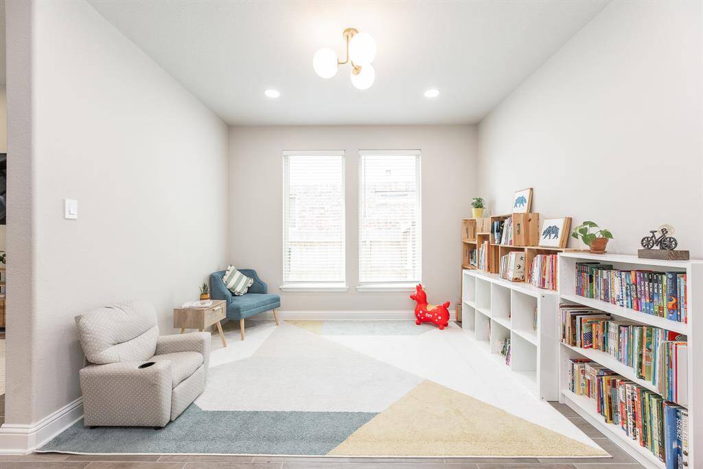 Formal dining room currently being used as kid's play room