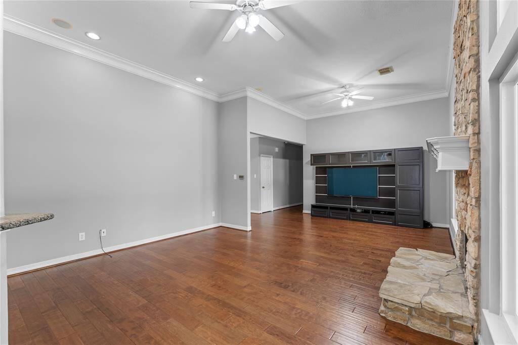 Views of den from kitchen area.