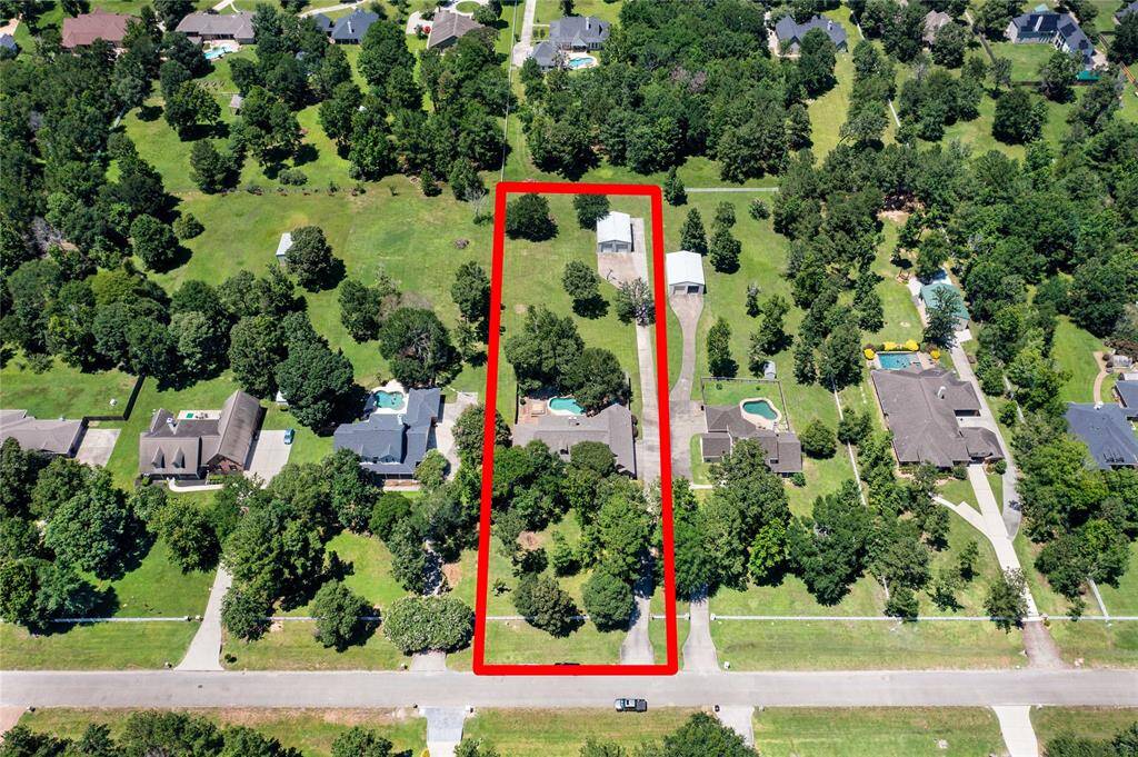 1.5 acres of beauty with everything you could ever want!