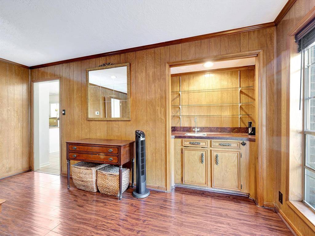 Door on left leads to the kitchen.