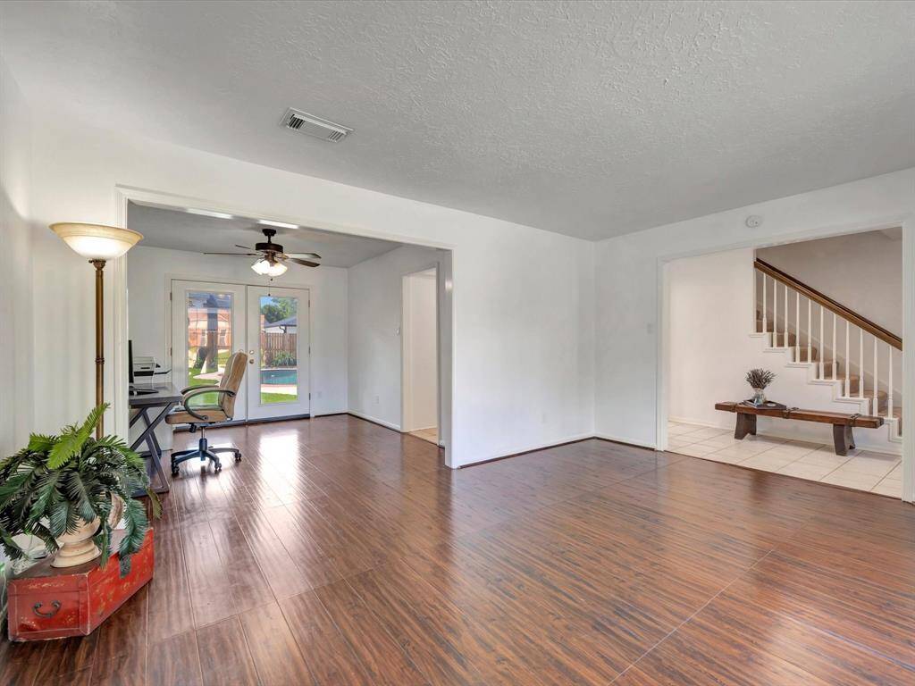 Living room looking into dining room.