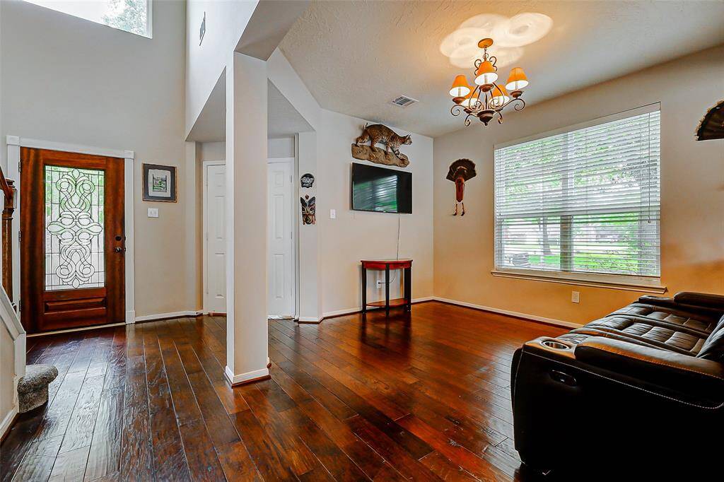 Opposite view of entry and dining area.