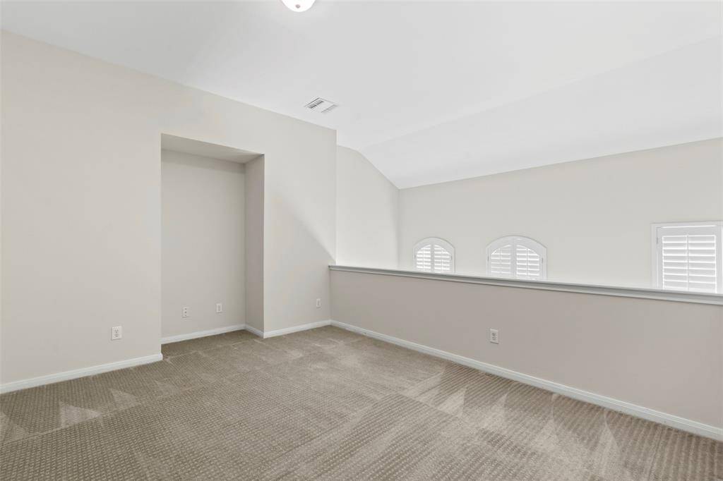 Versatile third-floor space perfect for an office, gym, or playroom