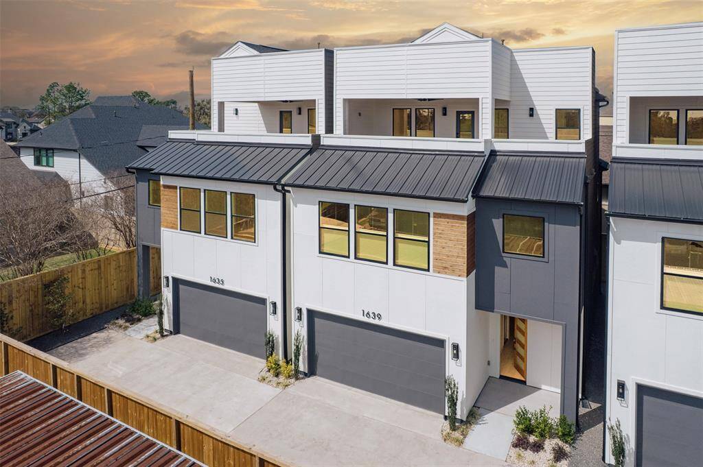 These stunning elevations bring a sophisticated modern feel with metal roof accents along with smooth hardie panels as well as warm wood tones.