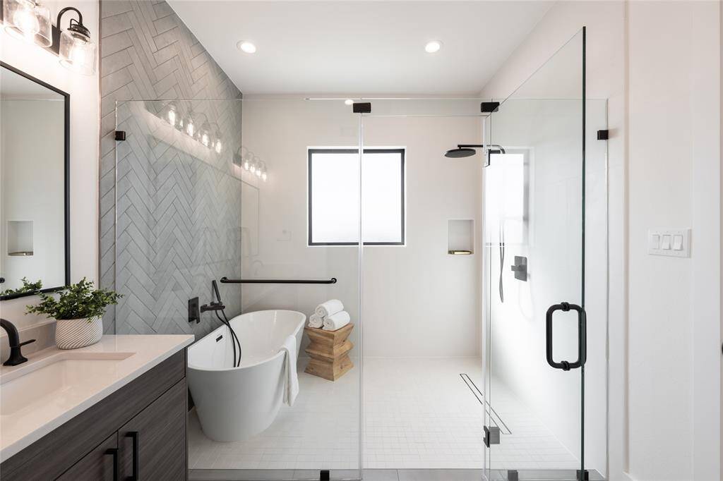 Thoughtful lighting design accentuates the clean lines and contemporary sophistication of the space.