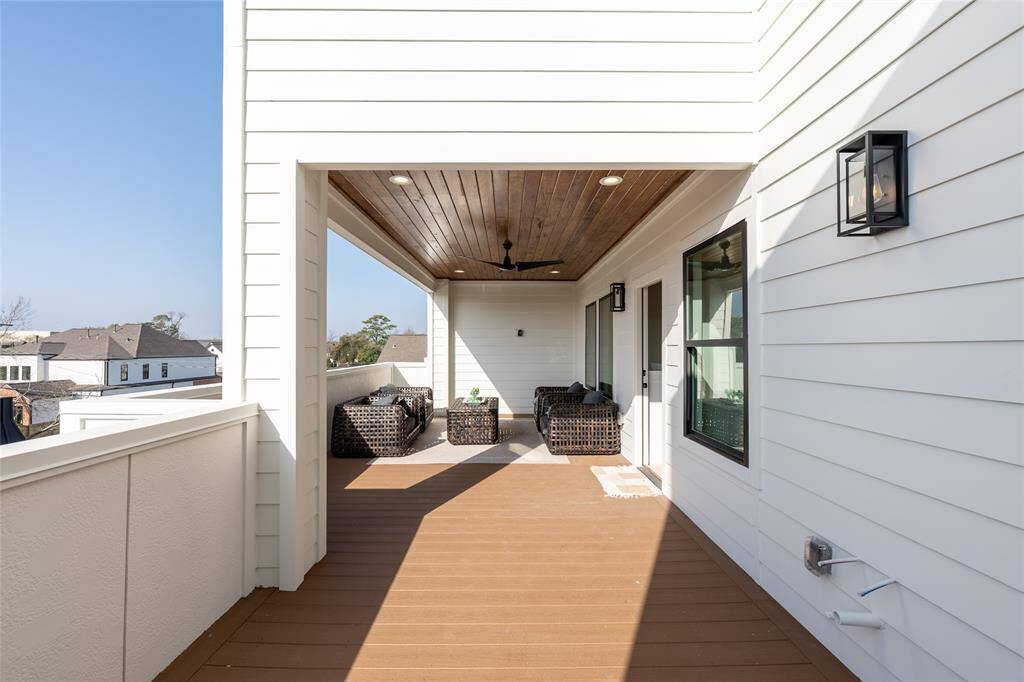 A seamless extension of the home’s interior, this covered outdoor space offers the perfect setting for year-round relaxation.