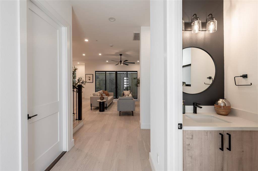 Thoughtful design meets understated luxury in this entryway, where sleek finishes and ambient lighting create a welcoming ambiance.